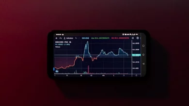 Phone showing a trading graph